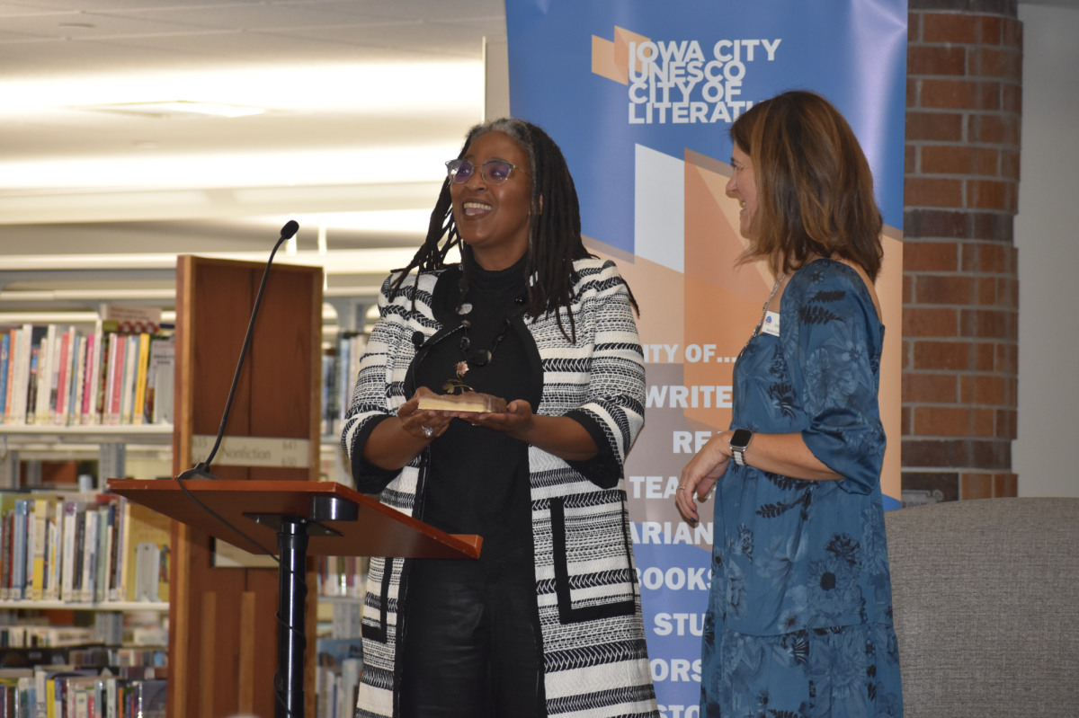 Camille Dungy '91 receives the Paul Engle Prize from the Iowa City UNESCO City of Literature on Nov. 14. As the 2024 winner, Dungy is the 13th recipient of the award. 